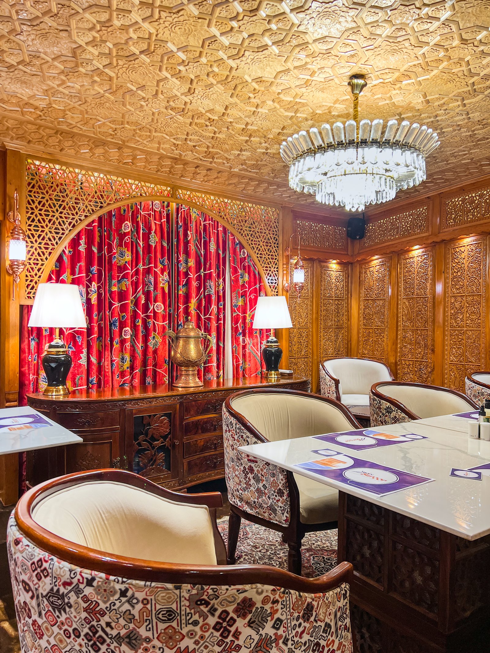 Kashmiri dining room interior at Suroor luxury houseboat Dal Lake